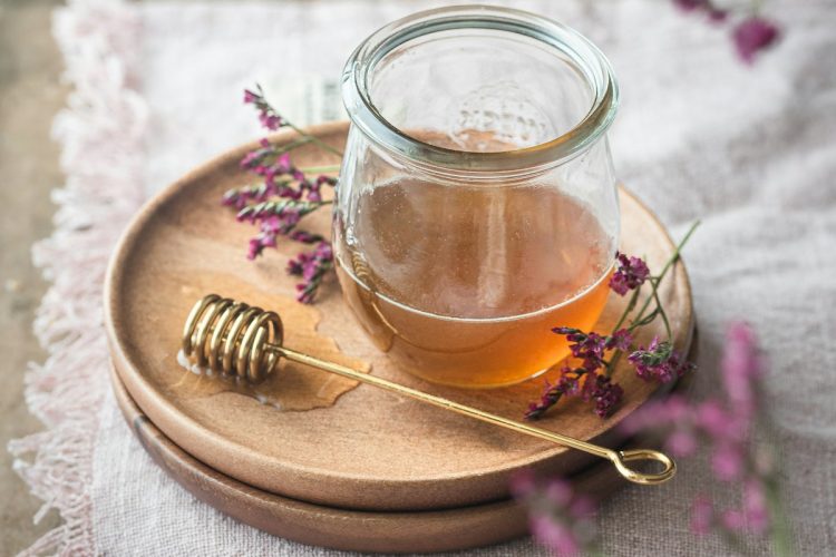 Jar of honey with flowers, a Thanksgiving gift guide pick under $25
